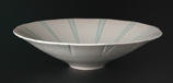 bluish white porcelain bowl with colored lines