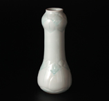 white porcelain vase with colored floral lines